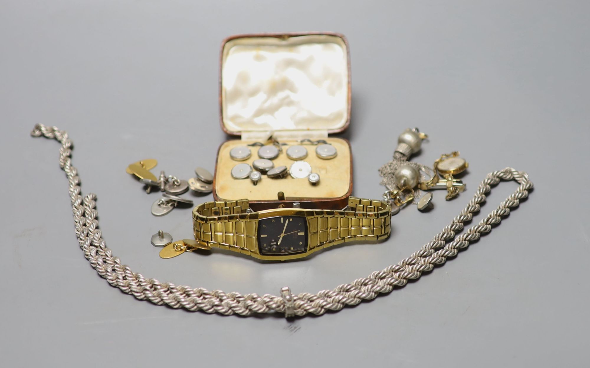 A ladys 9ct gold wrist watch on a plated strap, a Citizen Eco Drive watch, a cased six piece white metal and mother of pearl...